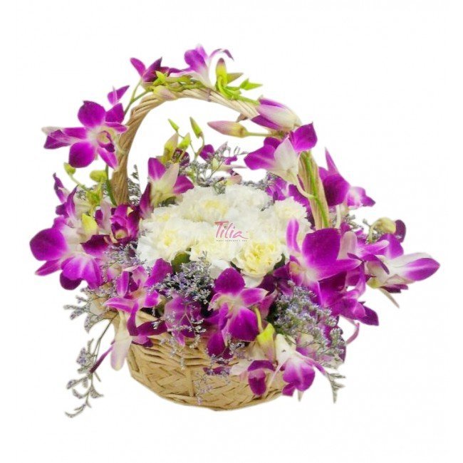 o013_orchids_round_arrangement_in_a_basket1.jpg