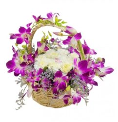 o013_orchids_round_arrangement_in_a_basket1.jpg