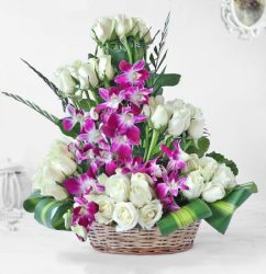 p-white-roses-and-orchids-in-cane-basket-112360-m1.jpg